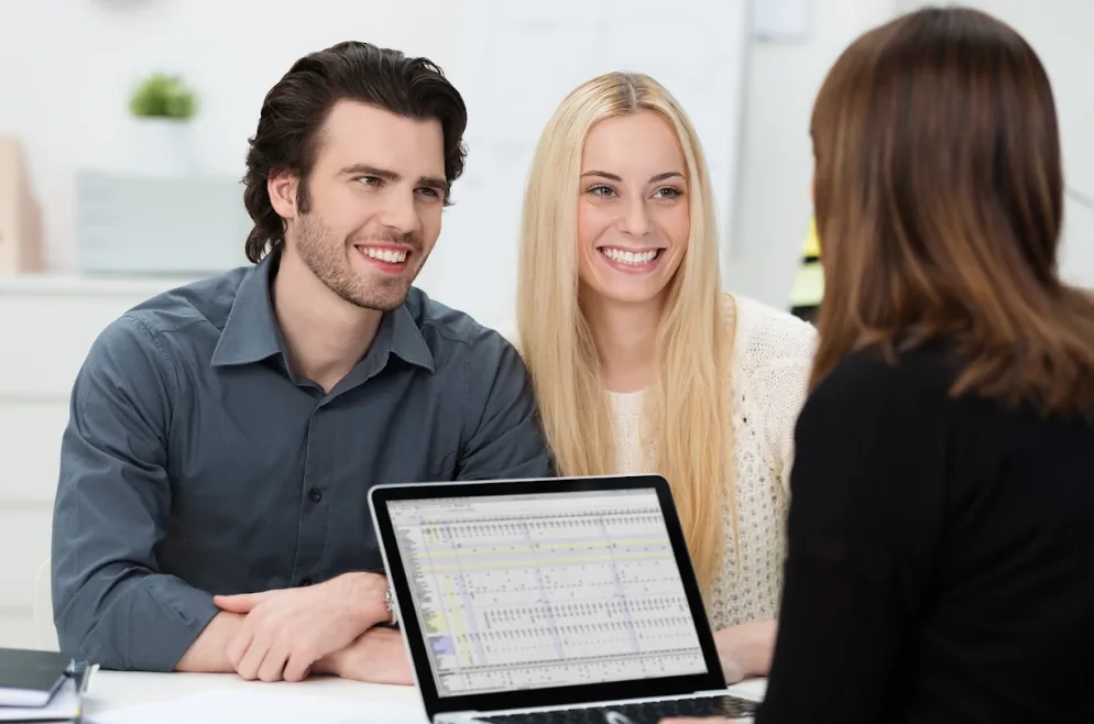Patients reviewing financing options with a Walnut Creek Dental team member