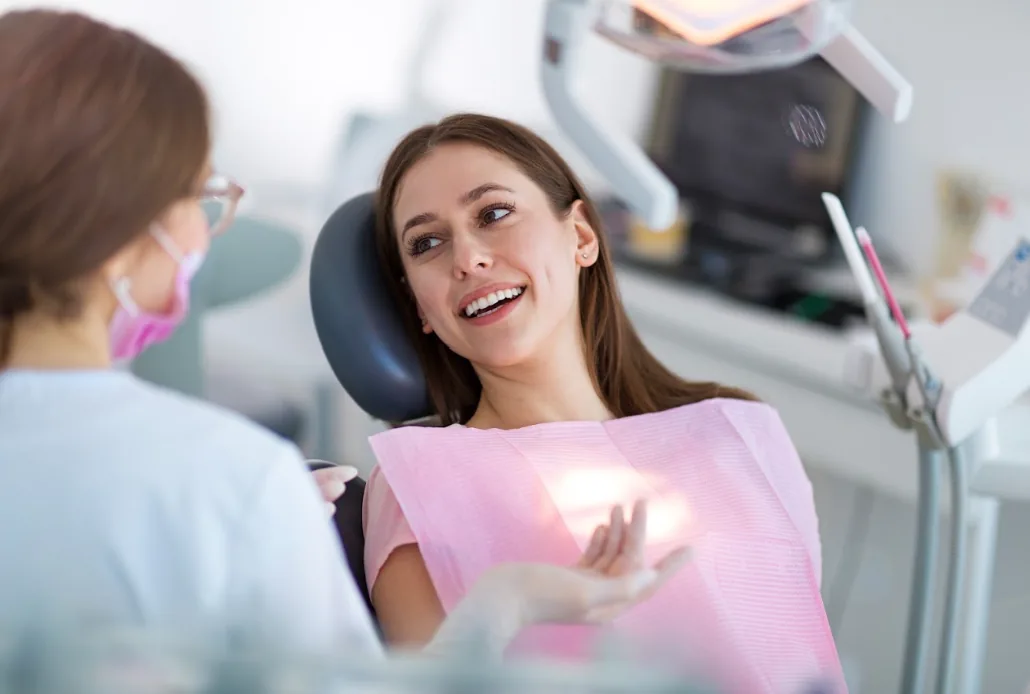 Patient smiling during a consultation with a Walnut Creek Dental team member